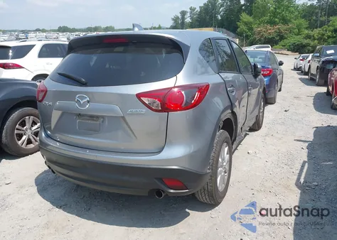 2014 Mazda Cx-5 Touring from USA, damaged, VIN JM3KE2CY2E0316358